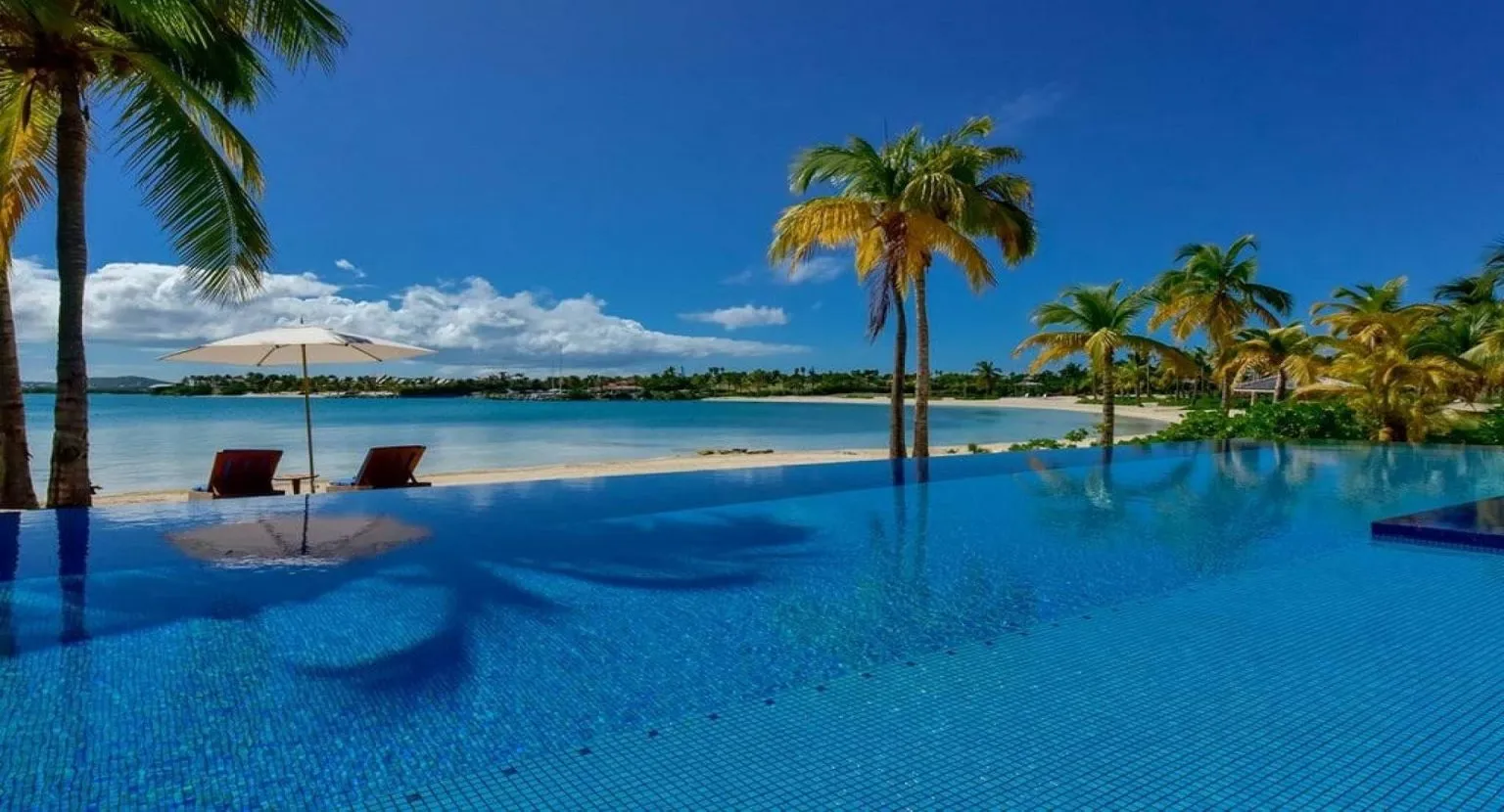 Blue Belle, a beachfront rental villa on Jumby Bay Island, Antigua