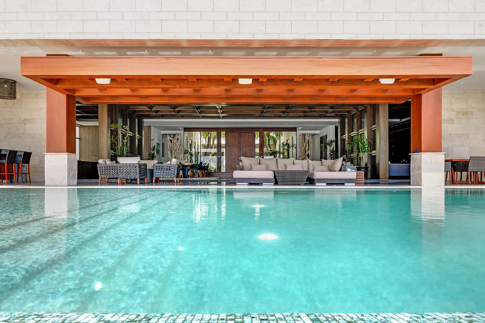 The pool of Casa Nube Blanca, a contemporary rental villa in Playacar Phase 1, Playa del Carmen