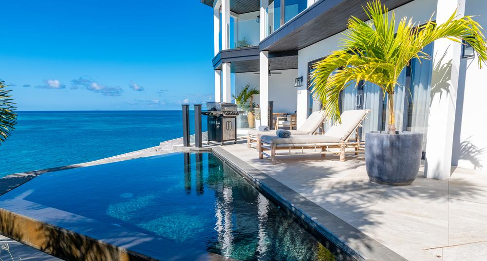 Sunset Cove, a beachfront rental villa on Jumby Bay Island, Antigua