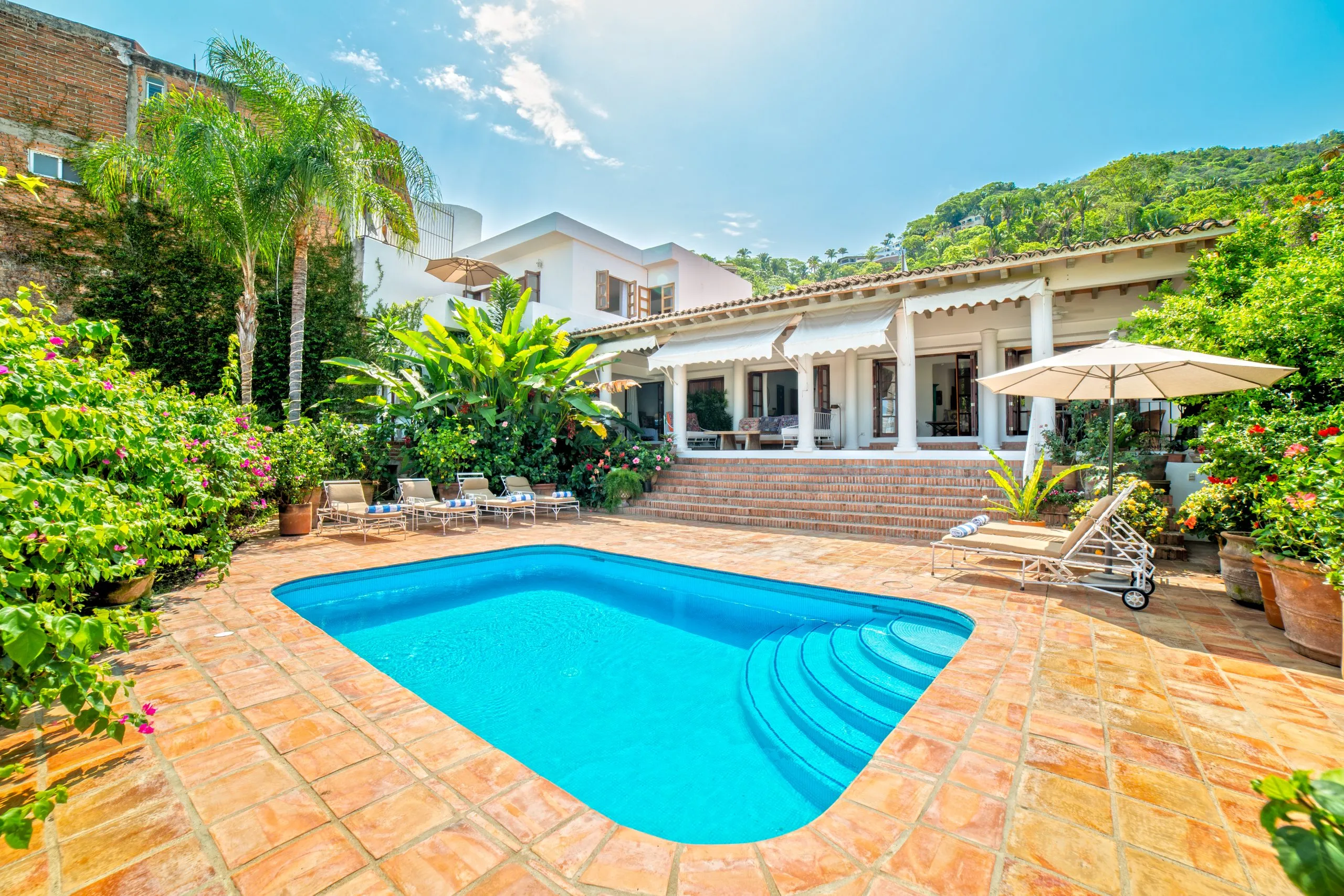 The pool terrace of Villa Veranda, a rental villa in upper Conchas Chinas, Puerto Vallarta