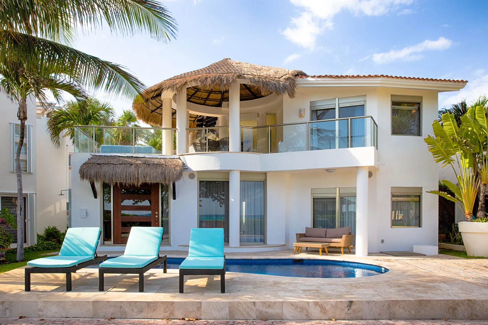 Villa Turquesa, a beachfront rental villa with a palapa-roofed terrace in Playacar Phase 1, Playa del Carmen