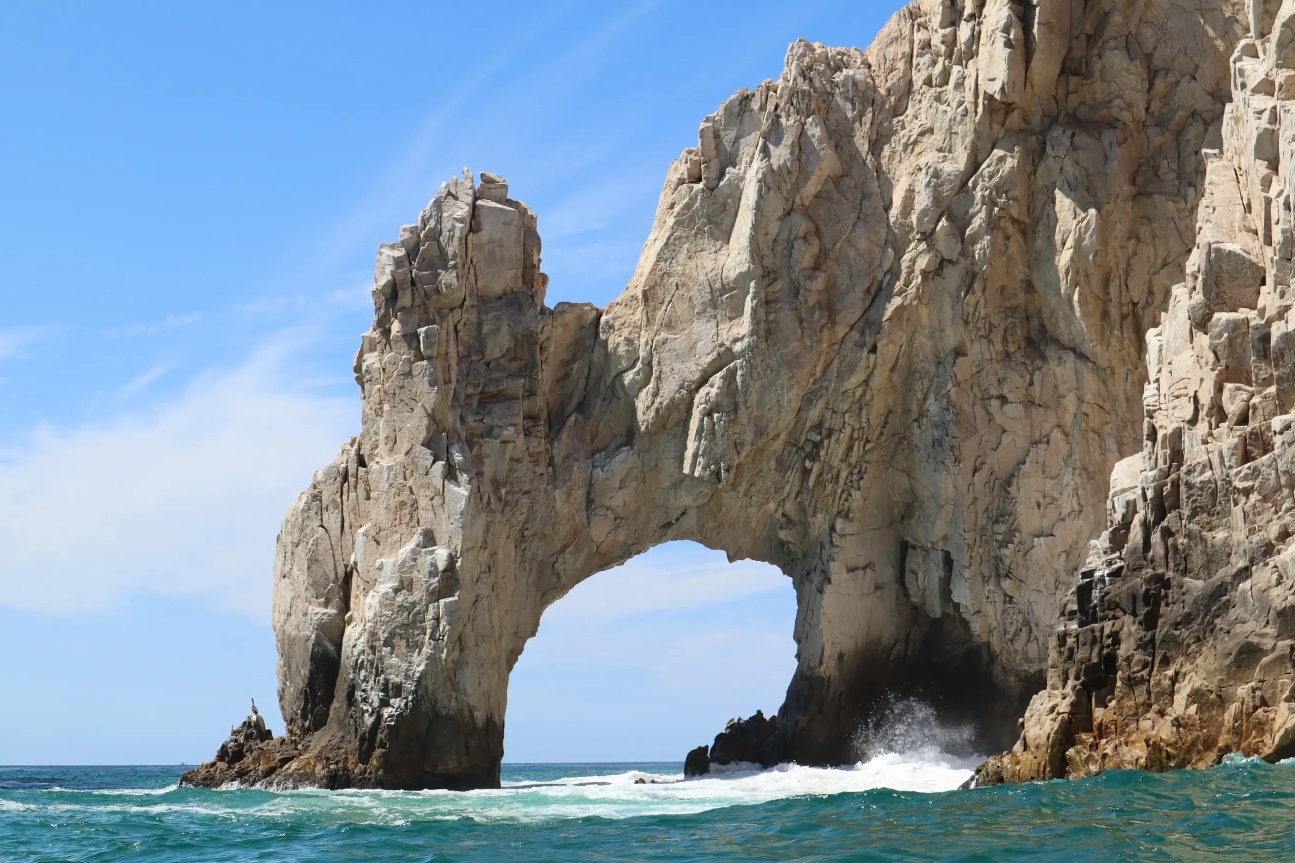 El Arco rock arch rising above turquoise water at Cabo San Lucas.